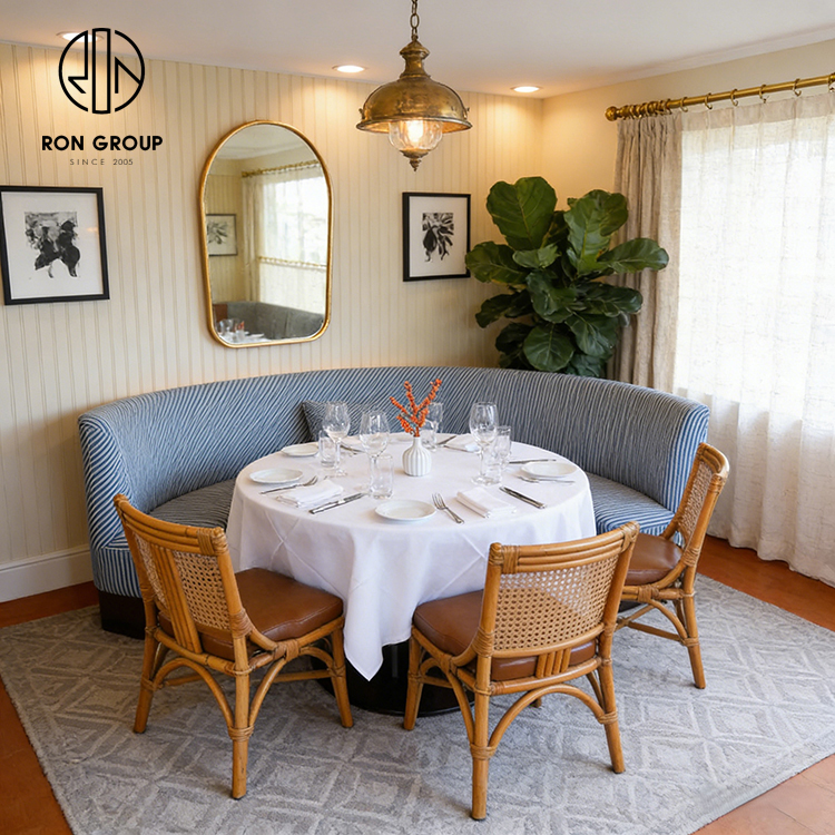 Custom Curved Booth Seating with Octagonal Stone Table for Space-Efficient Dining