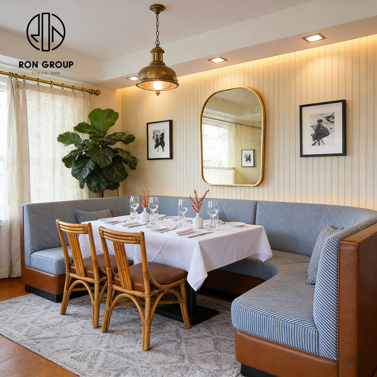 Custom Curved Booth Seating with Octagonal Stone Table for Space-Efficient Dining