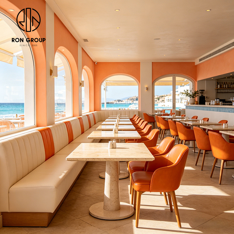 Modern Coastal Restaurant Furniture Set with Cream Leather Booth Seating, Square Terrazzo Tables and Orange Dining Chairs
