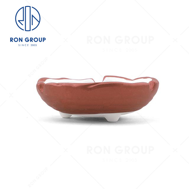 Wholesale cheap modern restaurant hotel Rose gold three-legged ceramic ashtray