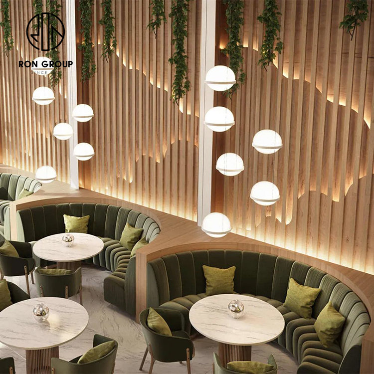 Modern Green Velvet Curved Booth Seating Set With Round Marble Tables And Cafe Chairs